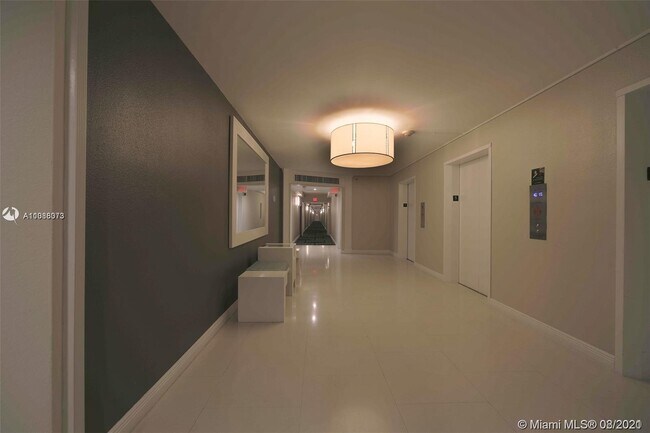Building Photo - 5600 Collins Ave