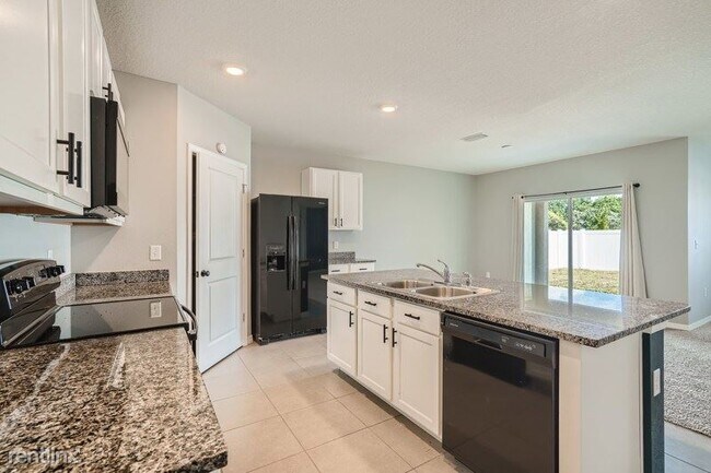 Foto del edificio - 4 br, 2 bath House - 10204 Golden Light Co...