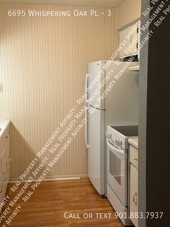 Foto del edificio - 6695 Whispering Oak Pl