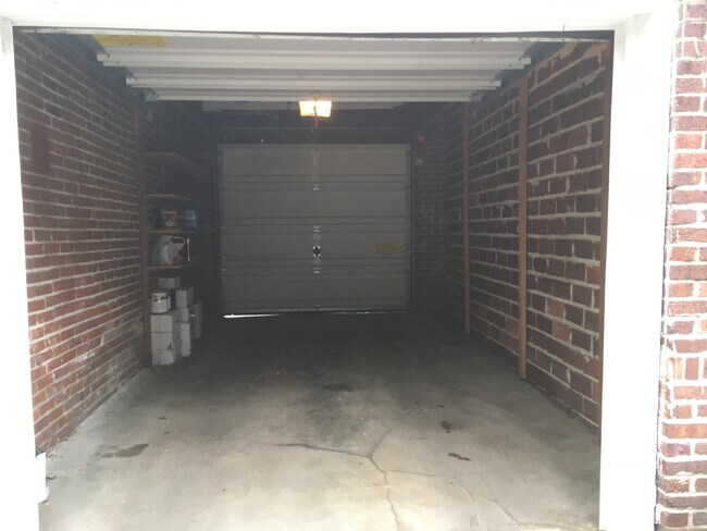 Private garage space. - 945 Washington St Apartments