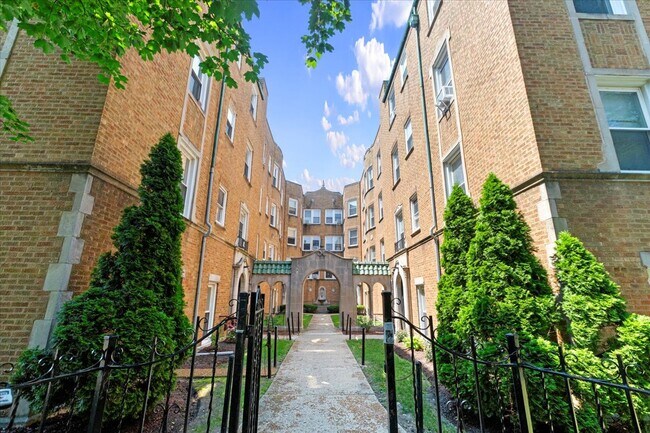 Building Photo - 6414 N Newgard Ave