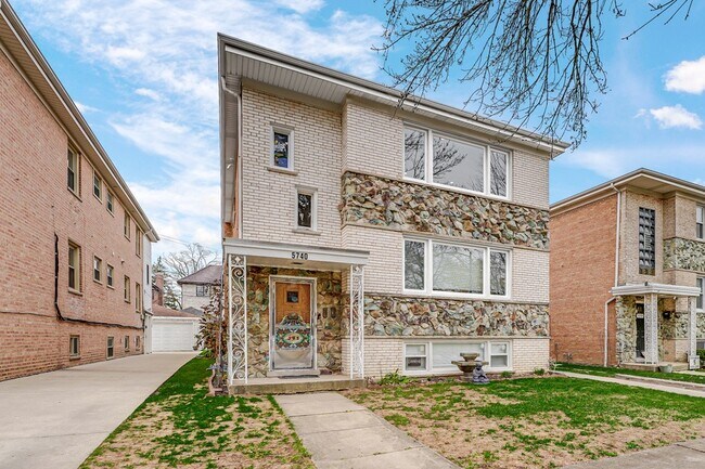 Foto del edificio - 5740 N Lowell Ave