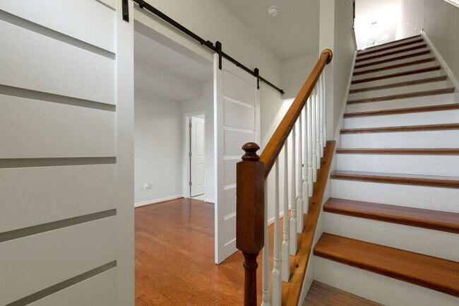 Building Photo - Stylish & Eco Friendly Townhome in Prime D...