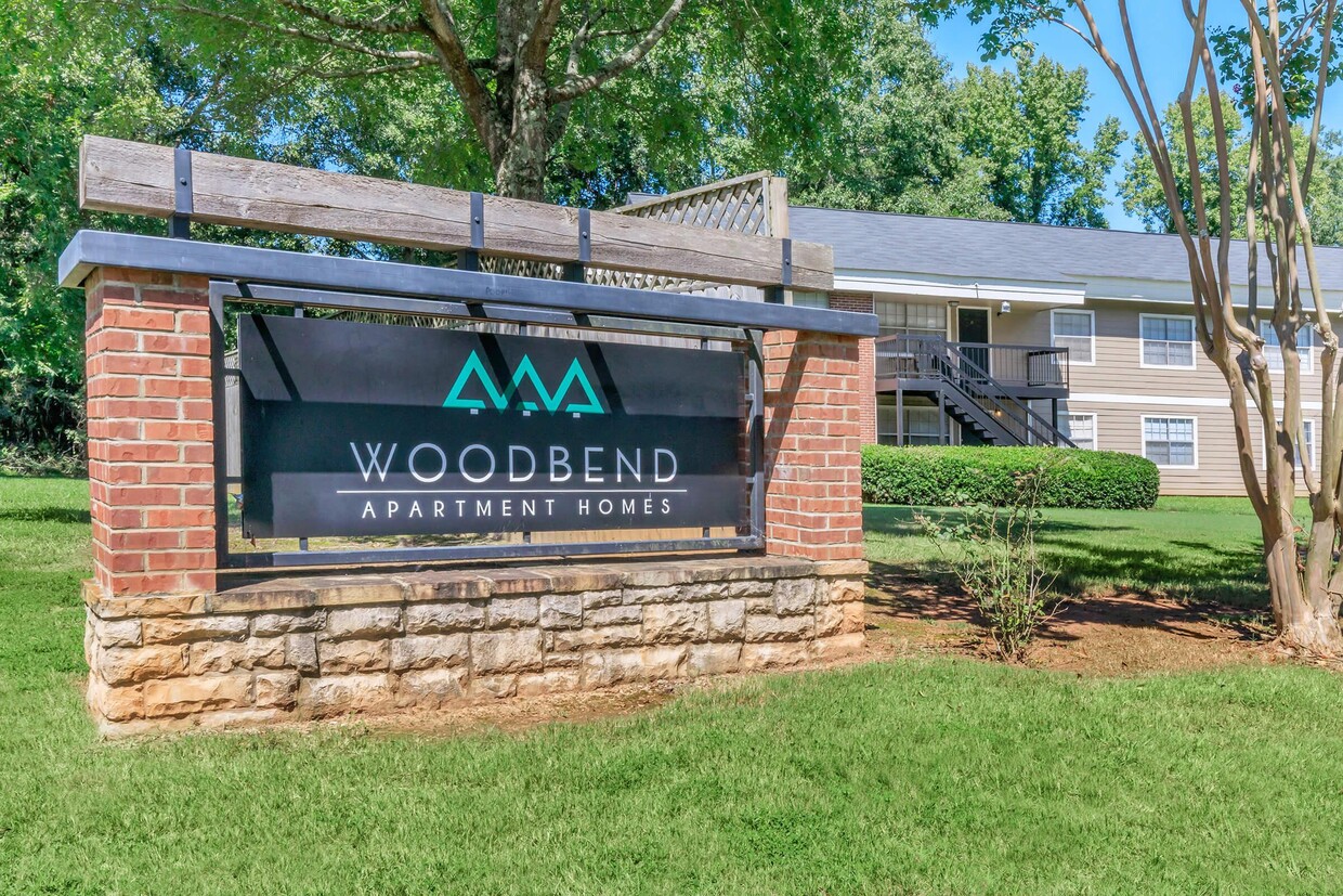 Entrance Sign - Woodbend Apartments