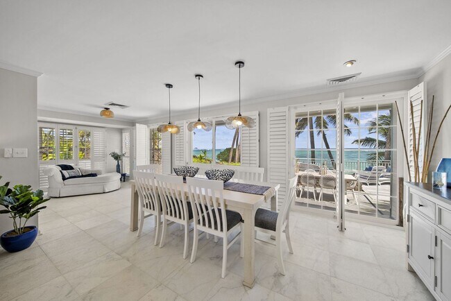 Foto del edificio - Immerse in Luxury & Tranquility at Beachfront 4BR Abode w/ Stunning Ocean Views