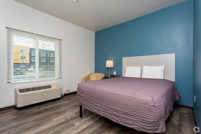 Building Photo - WoodSpring Apartments