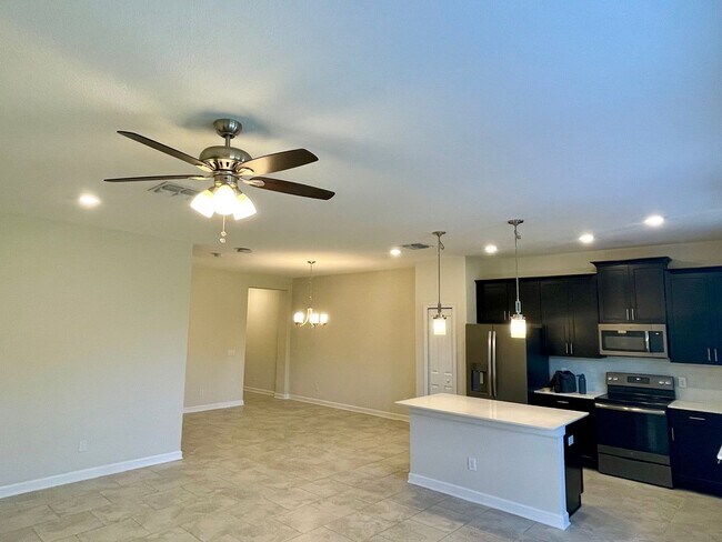 Building Photo - 4 Bedroom, 3.5 Bath Townhome in Lake Nona-...