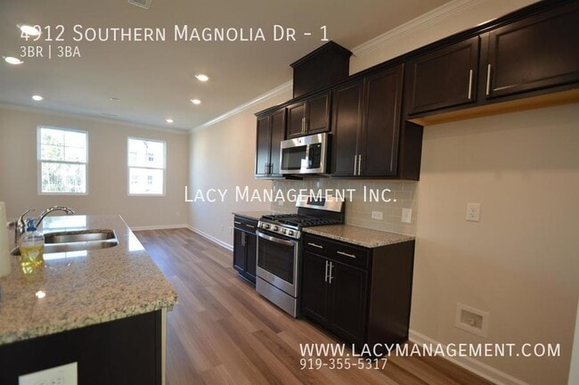 Building Photo - A Beautiful Townhome with SS Appliances an...