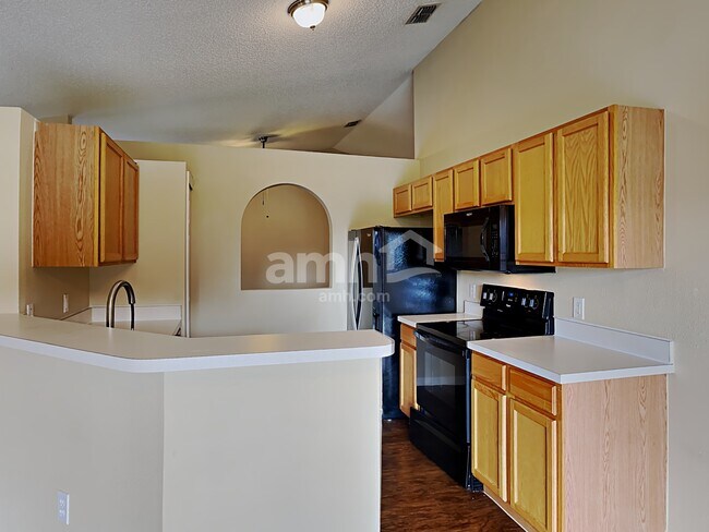 Building Photo - 6407 Tabogi Trl