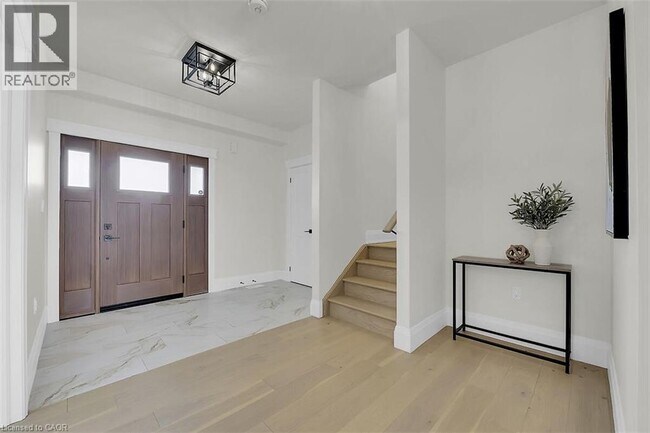 Building Photo - 8184 Airport Rd E