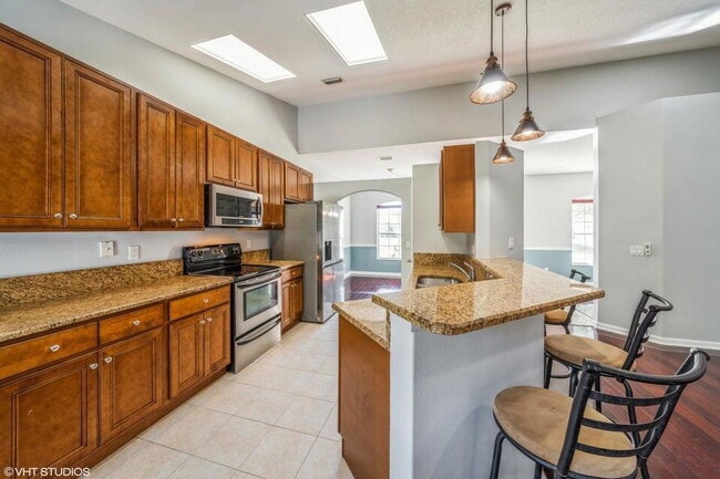 Photo - 5493 NW Evanston Ave House