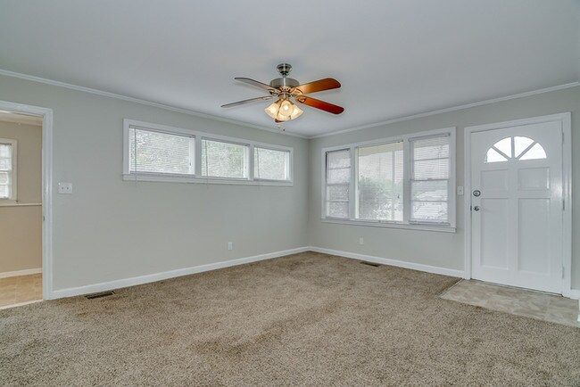 Building Photo - Three Bedroom with Private Driveway