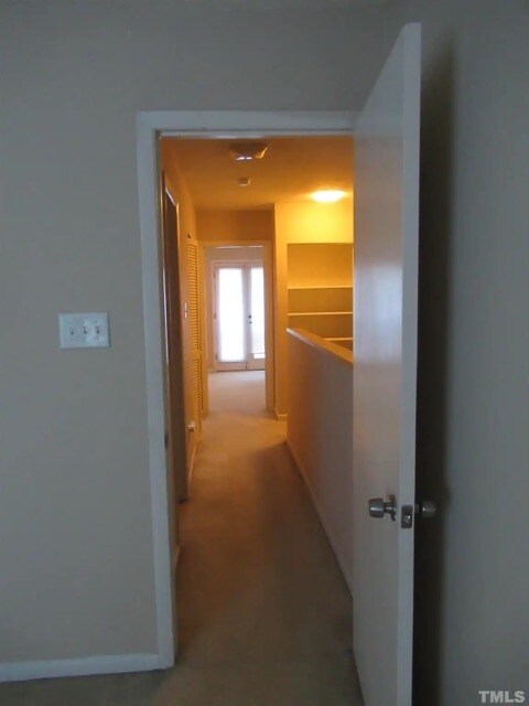 Hallway connecting two rooms - 250 S Estes Dr