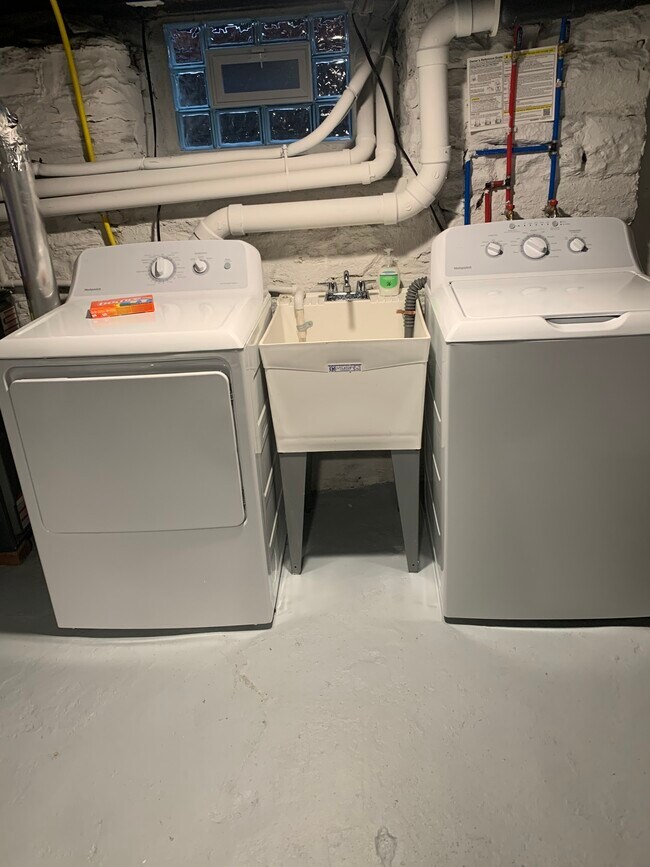 In the basement there is a washer in the dryer and a slop sink. Lots of storage area. - 172 Cotton Way
