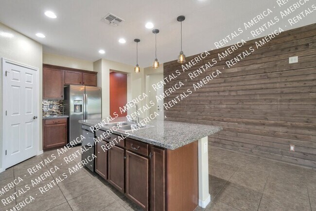 Foto del edificio - 10320 E Tahoe Ave