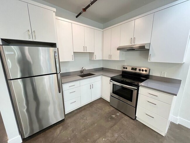 Building Photo - Modern space in historic building. Two mon...