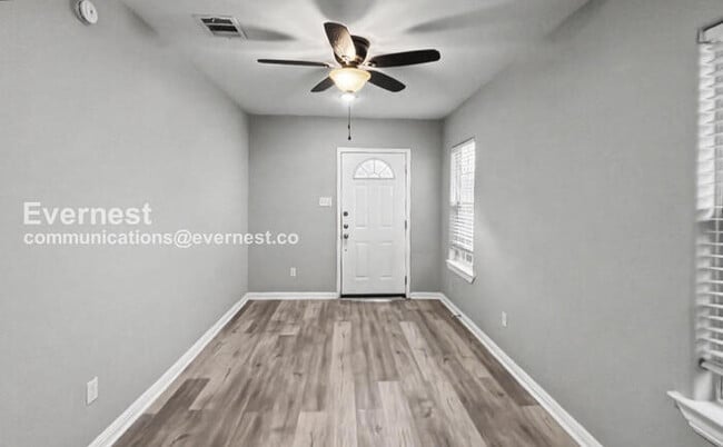 Foto del edificio - 2 Bed/1 Bath Condo with Fenced Yard / Pet-Friendly / Vouchers Accepted / Available Now!