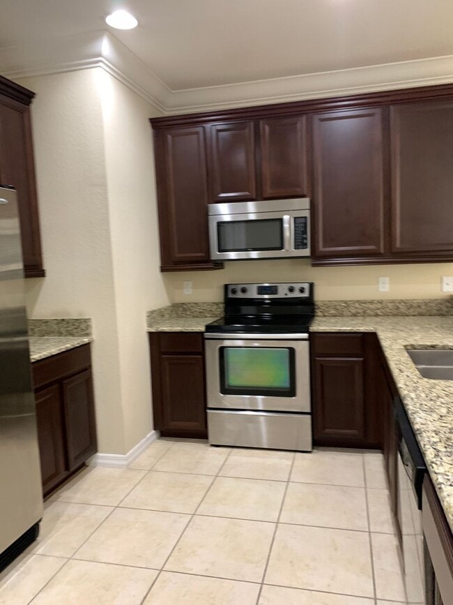 Building Photo - May move in!!   Isles of Oviedo Townhome, ...