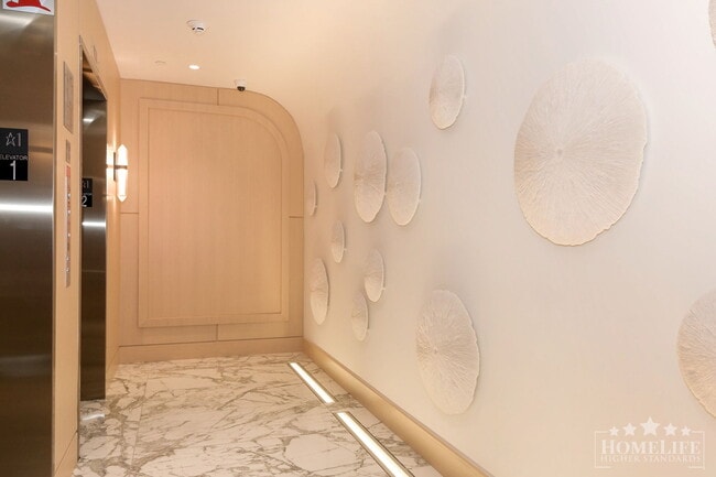 Building Photo - The Epitome of Coastal Luxury: Your New Ho...