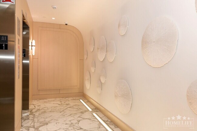 Photo du bâtiment - The Epitome of Coastal Luxury: Your New Ho...