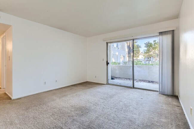 Building Photo - Elegant 2-Bedroom Condo in Gated Community...
