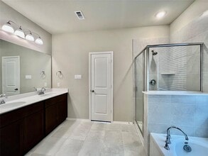 Building Photo - 8711 Windsong Trail Dr