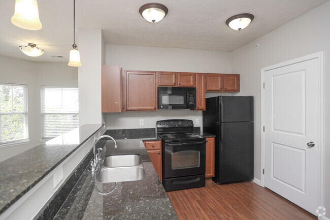 1BR, 1BA - 914 SF - Kitchen - Canyon Club at Perry Crossing