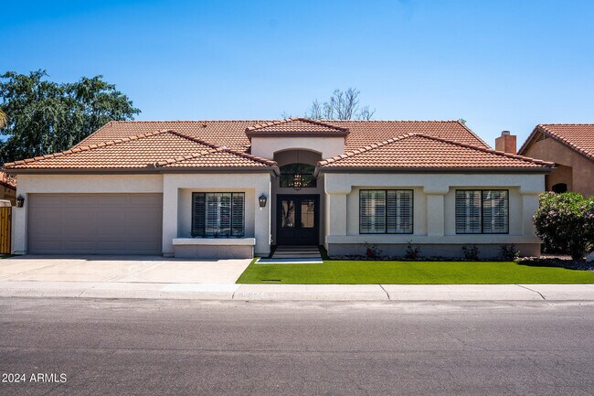Building Photo - 5827 E Aire Libre Ave