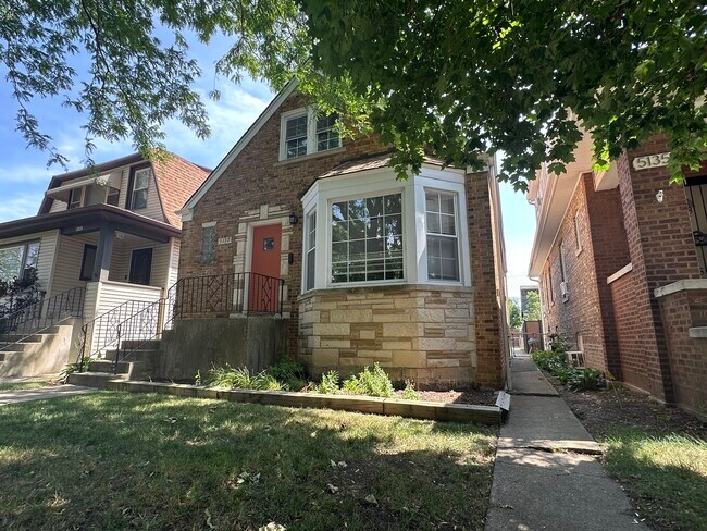 Foto del edificio - 5137 N Lowell Ave