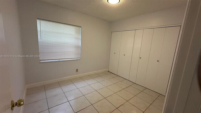 Building Photo - 11484 Royal Palm Blvd