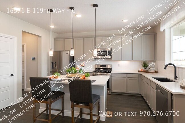 Foto del edificio - 16571 E 119th Way