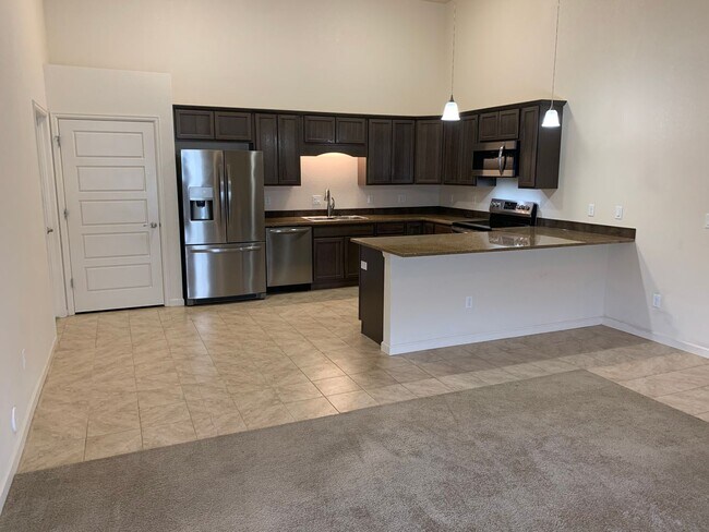 Building Photo - 2 BEDROOM, 2 BATHROOM TWINHOME WITH 2 CAR ...