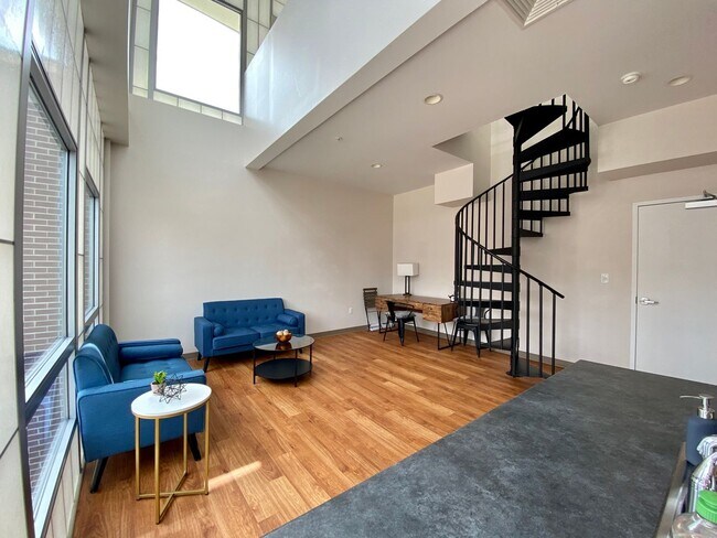 Foto del edificio - 116 E 3rd St