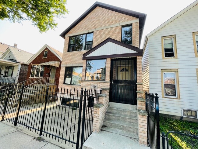 Building Photo - 3036 S Lowe Ave