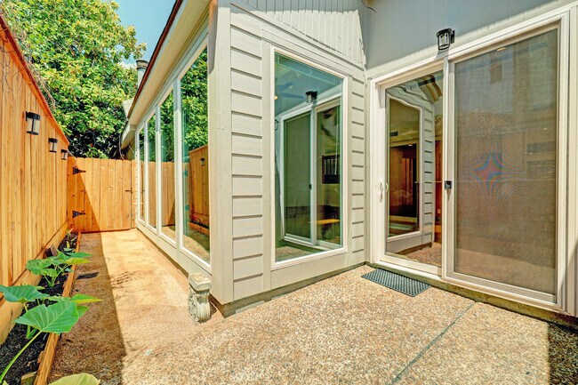 The back patio offers a private space to relax and enjoy a beverage. If gardening is your passion, t - 107 Phanturn Ln