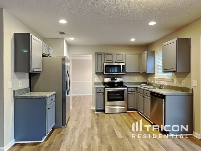 Foto del edificio - 8665 River Rock Ct