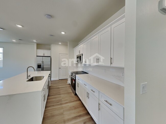 Building Photo - 8882 Dwarf Chin Ave
