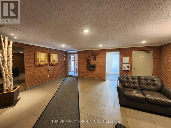 Building Photo - 1100-1100 Jalna Blvd