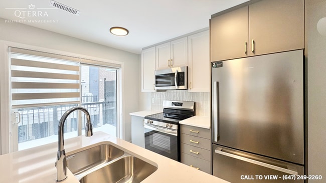 Photo du bâtiment - 701 Glenroy Gilbert Dr