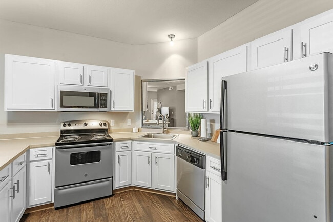 Experience the elegance of this sleek, modern kitchen, perfect for culinary enthusiasts. - Fairways at Lincoln