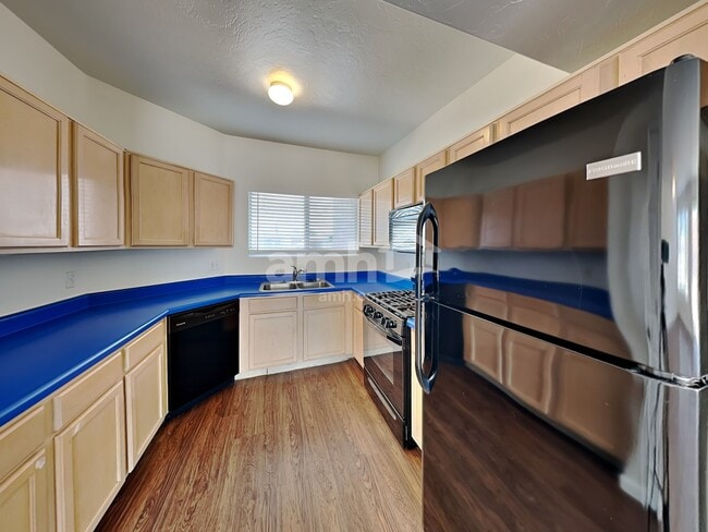 Building Photo - 6034 S Lostan Ave