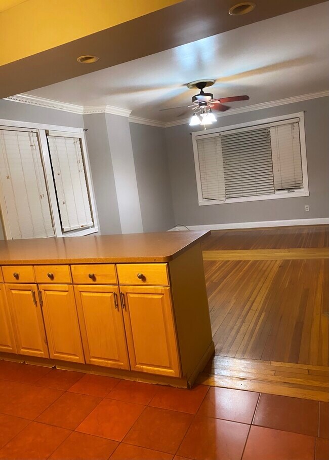Counter leads to living room - 11104 14th Ave
