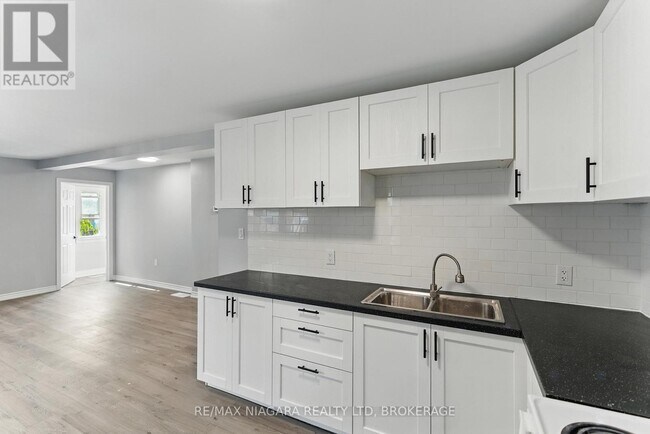 Photo du bâtiment - 290 Scholfield Ave S