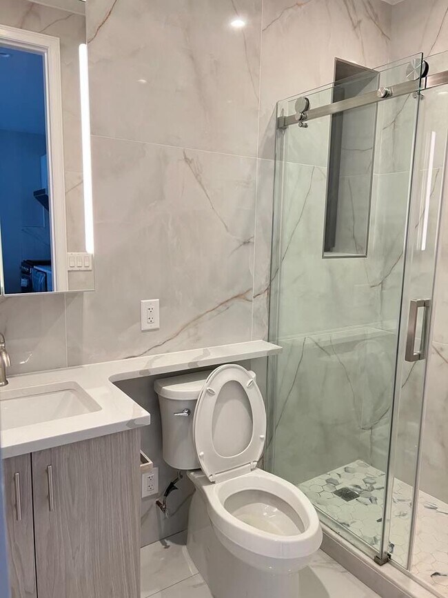 Guest Bathroom with full shower and newly installed LED lights - 30 Market St