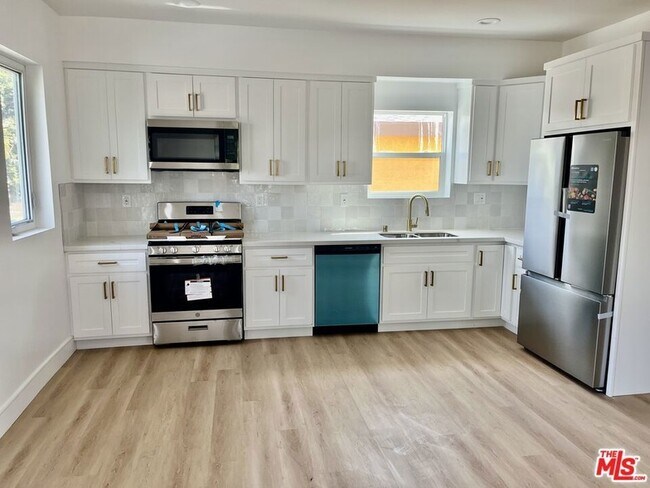 Foto del edificio - 2533 S Spaulding Avenue Unit 1/2