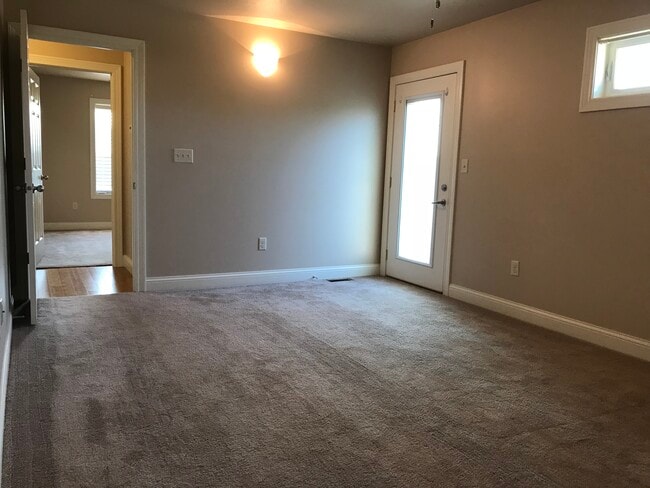 Master bedroom with patio access. - 104 Scenic Drive