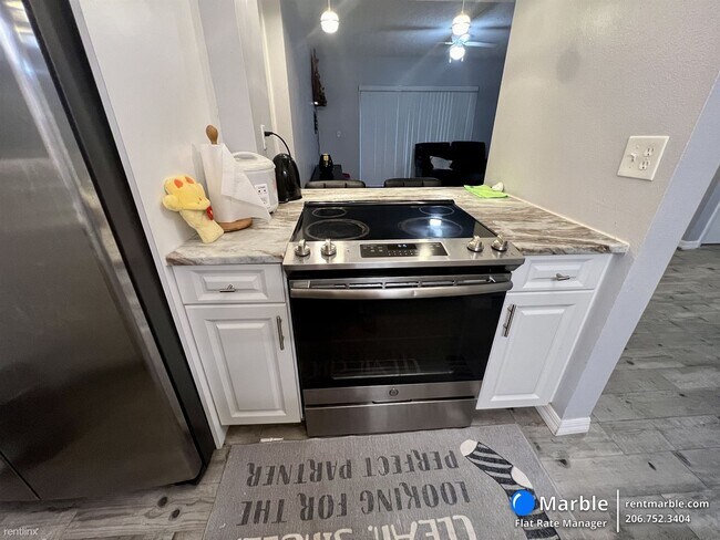 Building Photo - 2 br, 1 bath Condo - 4411 Shady Terrace Ln...