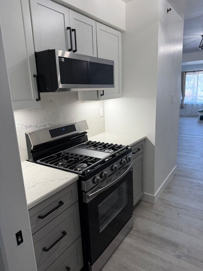 Building Photo - Beautifully remodeled 2-Bedroom, 1-Bath, 2-car tandem Condominium
