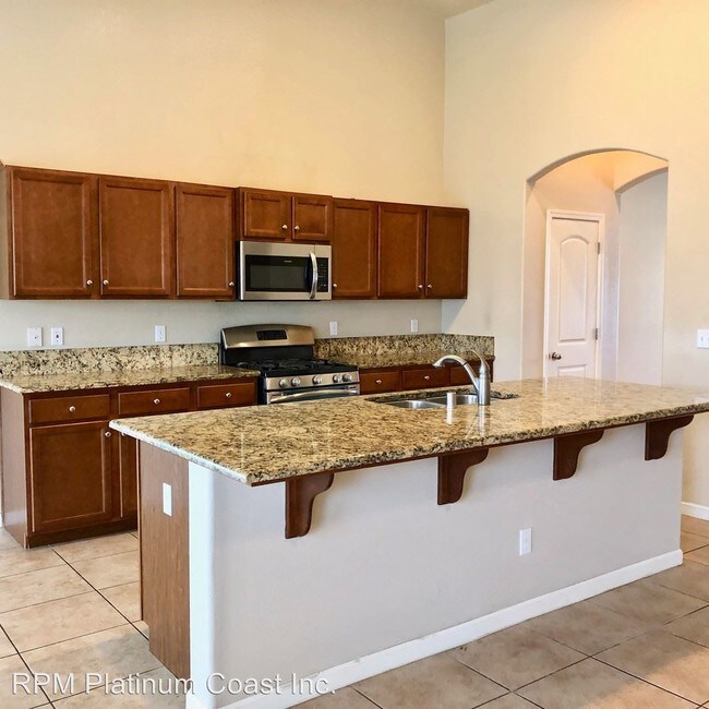 Building Photo - 4 br, 3 bath House - 5179 W Simpson Ave.
