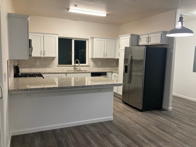 Kitchen, includes fridge! - 3928 S Burke St